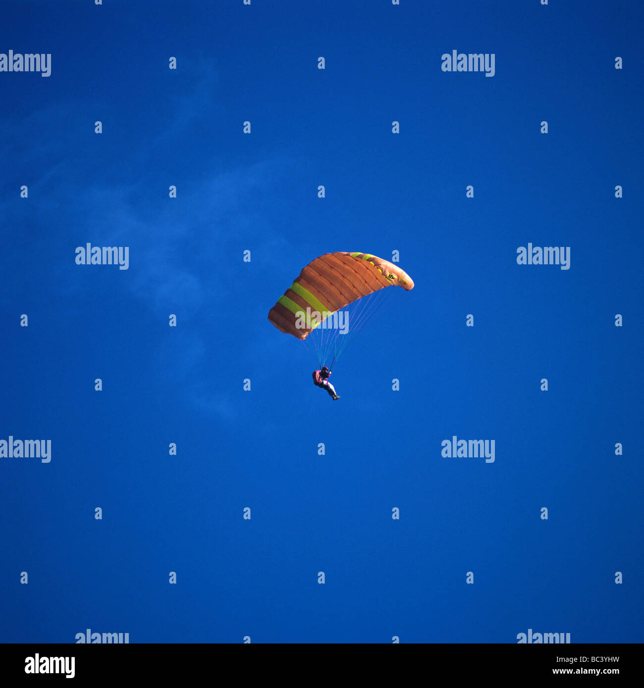 Hang-glider on a bottom of blue sky. Auvergne. France. Stock Photo
