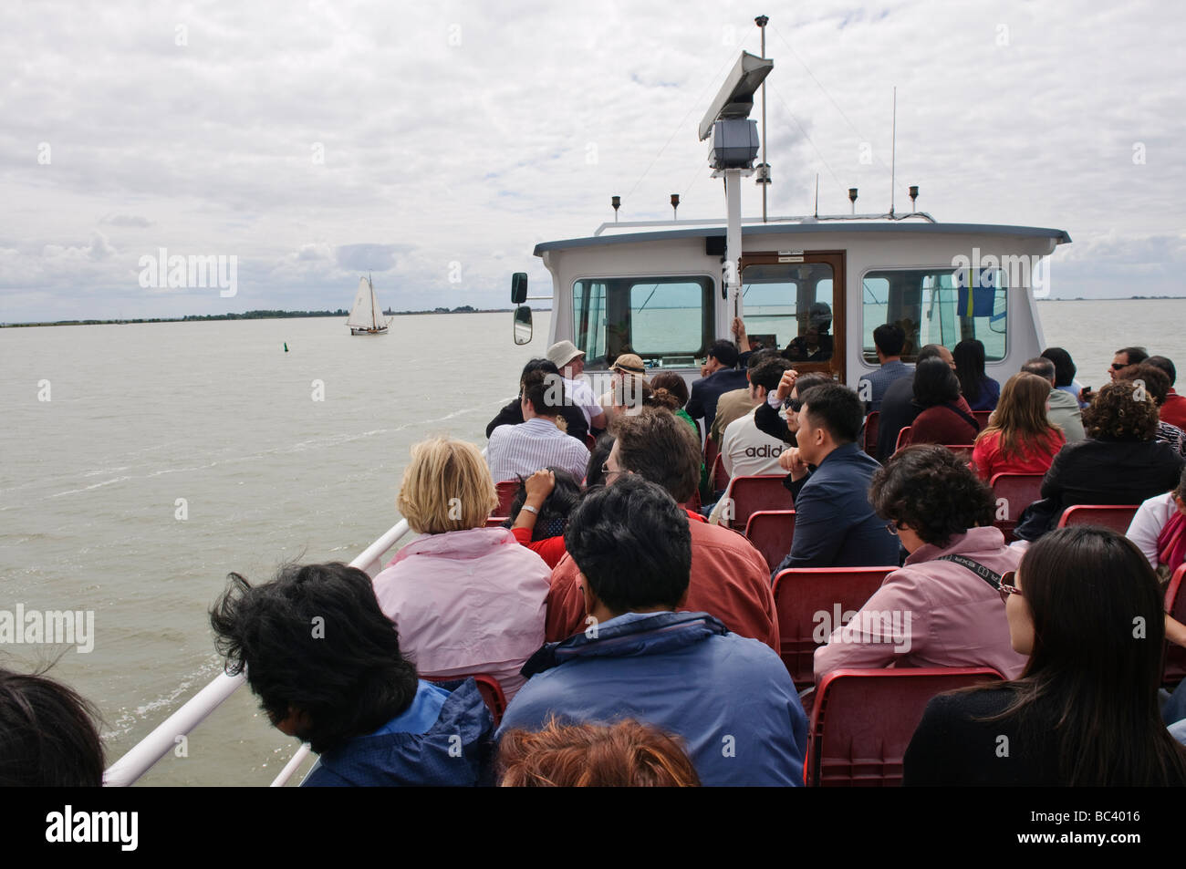 Passengers on a ferry from Volendam to Marken, Netherlands Stock Photo