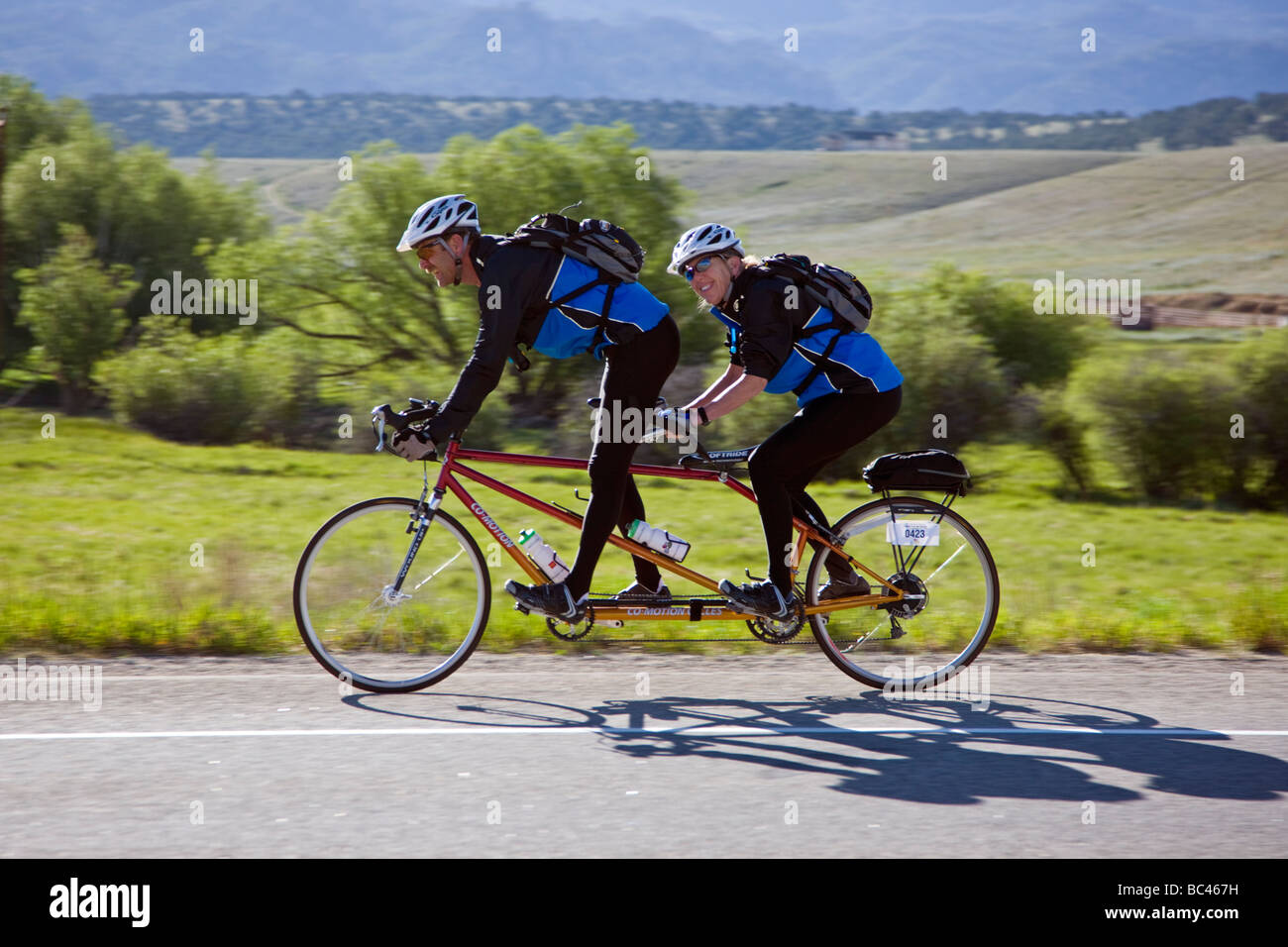 Cyclists riding between Salida and Buena Vista in Colorado during the annual Ride The Rockies bicycle tour Stock Photo