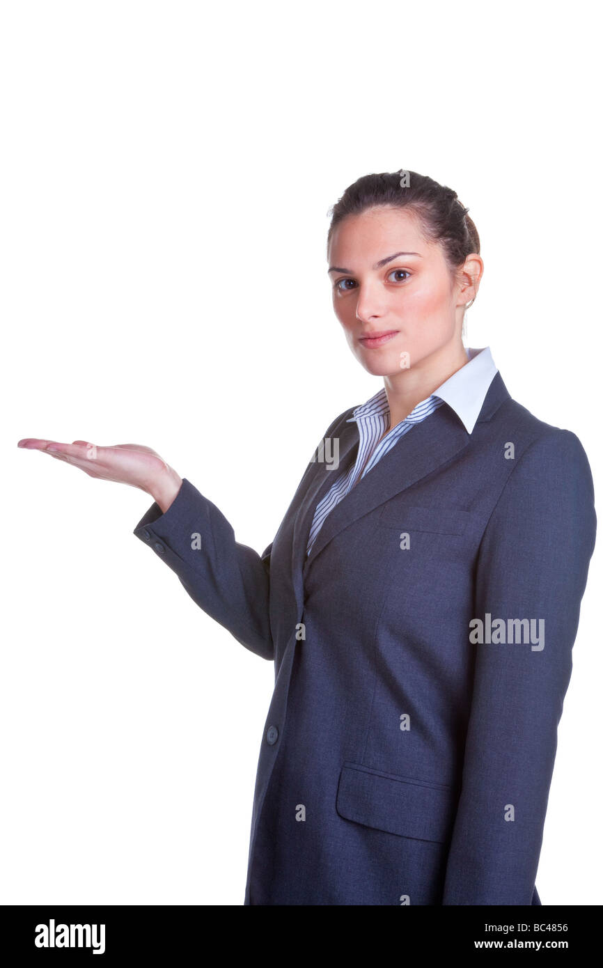 Businesswoman holding her hand out suitable for product placement isolated on a white background Stock Photo