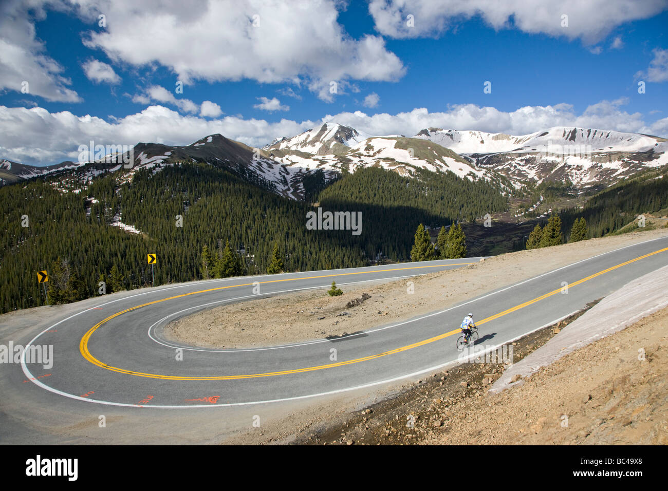 Cyclists riding up Independence Pass in Colorado during the annual Ride ...