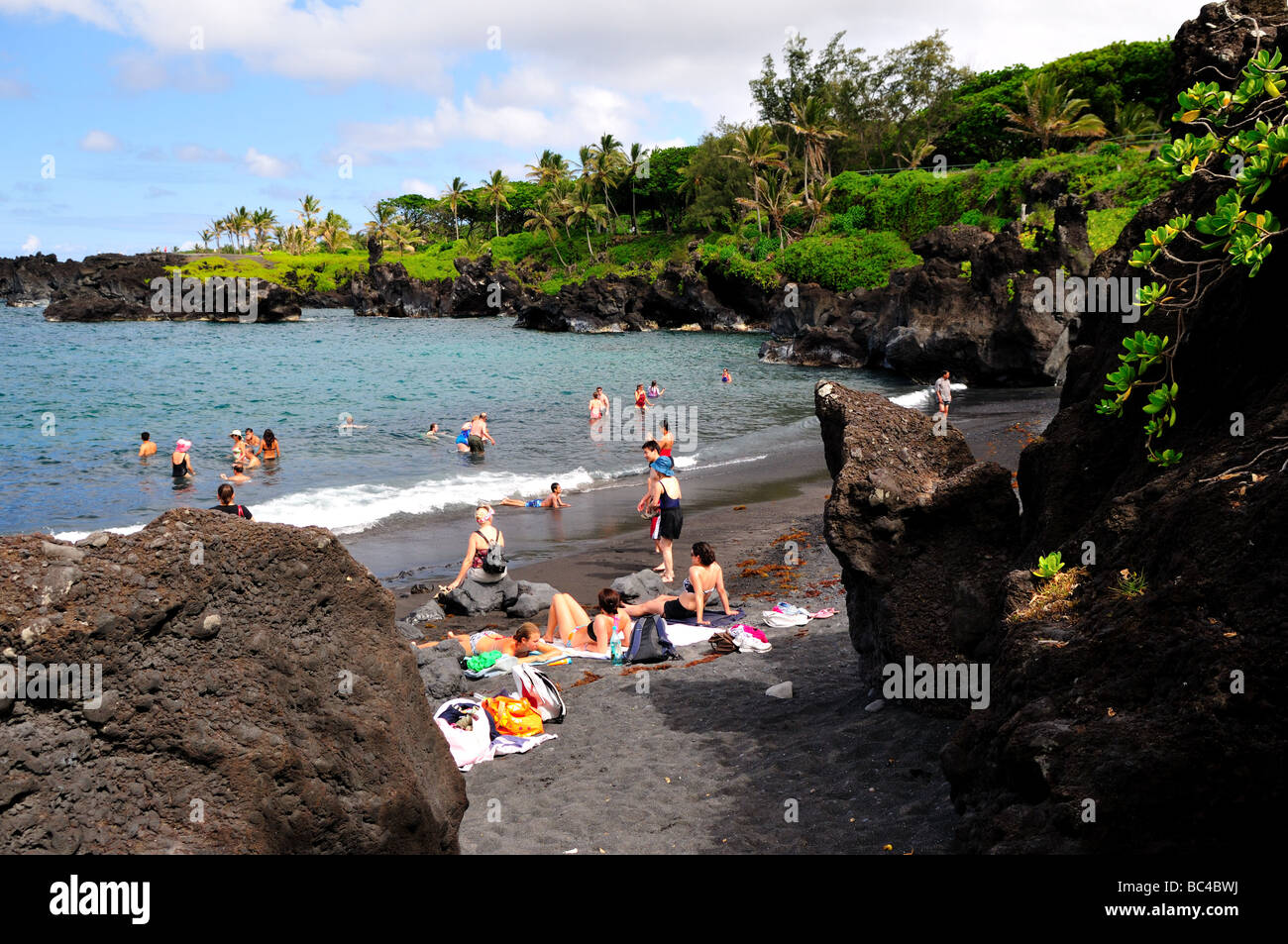 The Black sand beach at Waianapanapa State Park, Maui, Hawaii, USA. Stock Photo