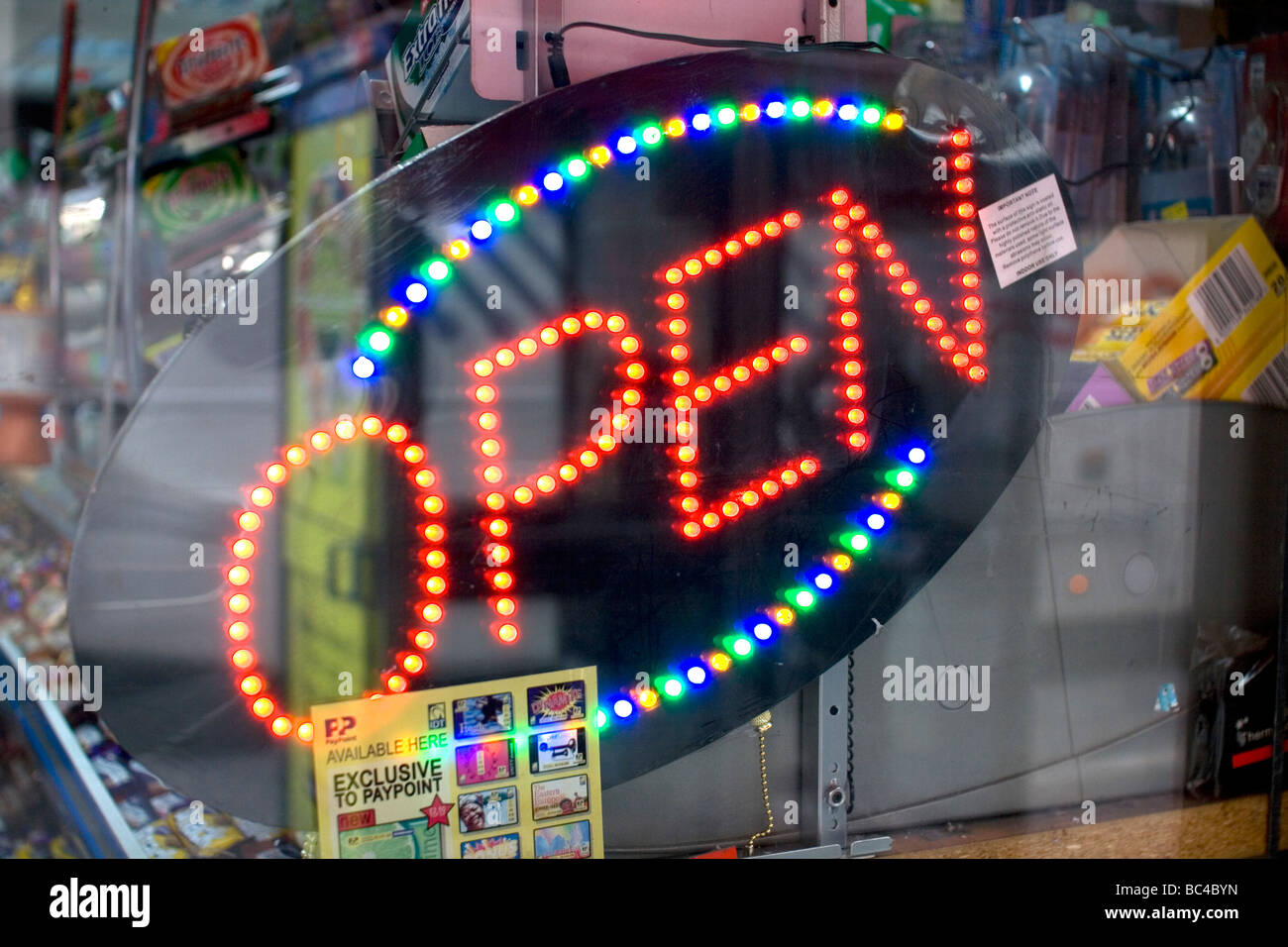 An 'Open' sign in a shop window. Stock Photo