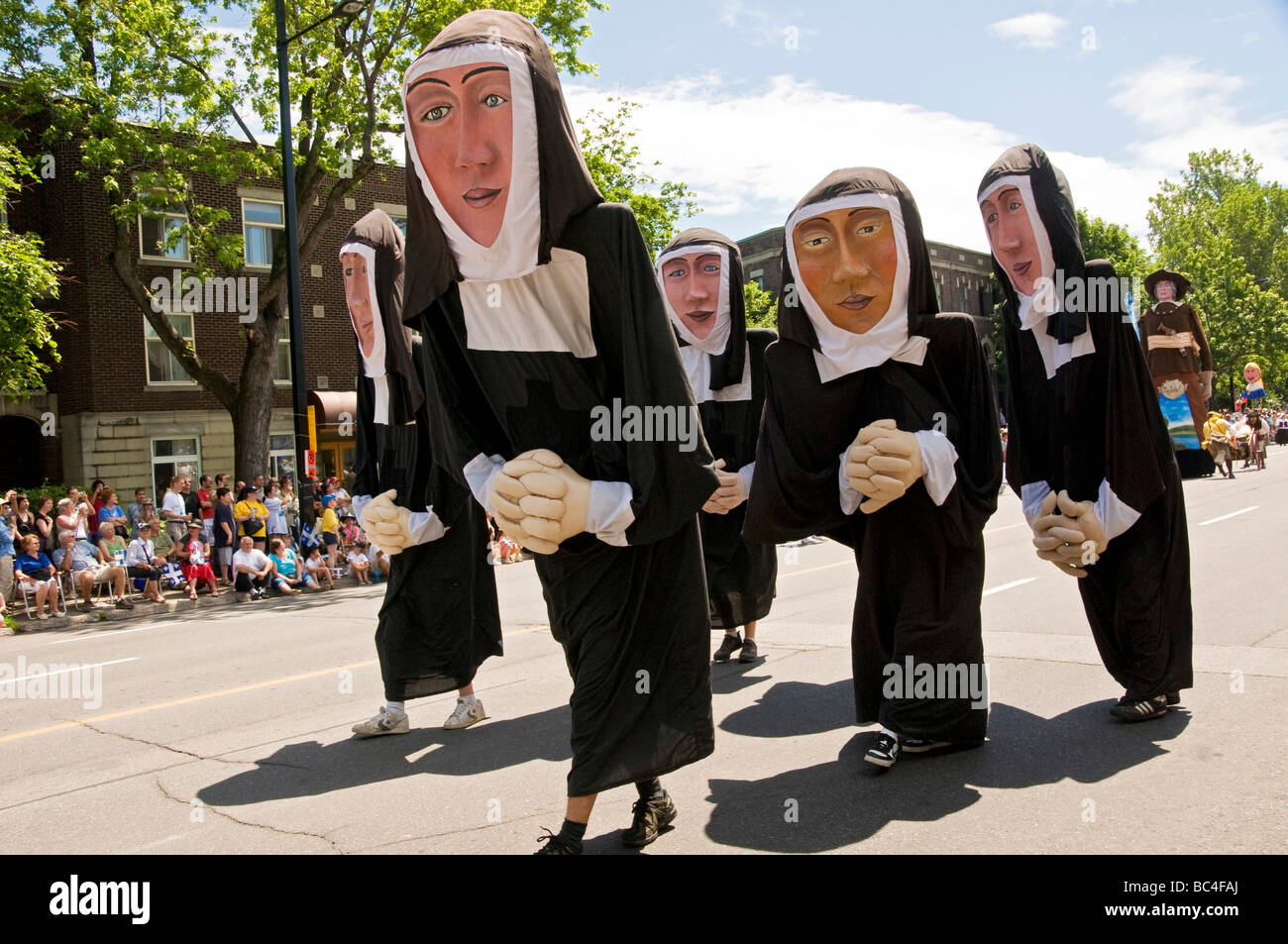Giant figurines at the Saint jean baptiste parade Montreal Quebec Canada Stock Photo