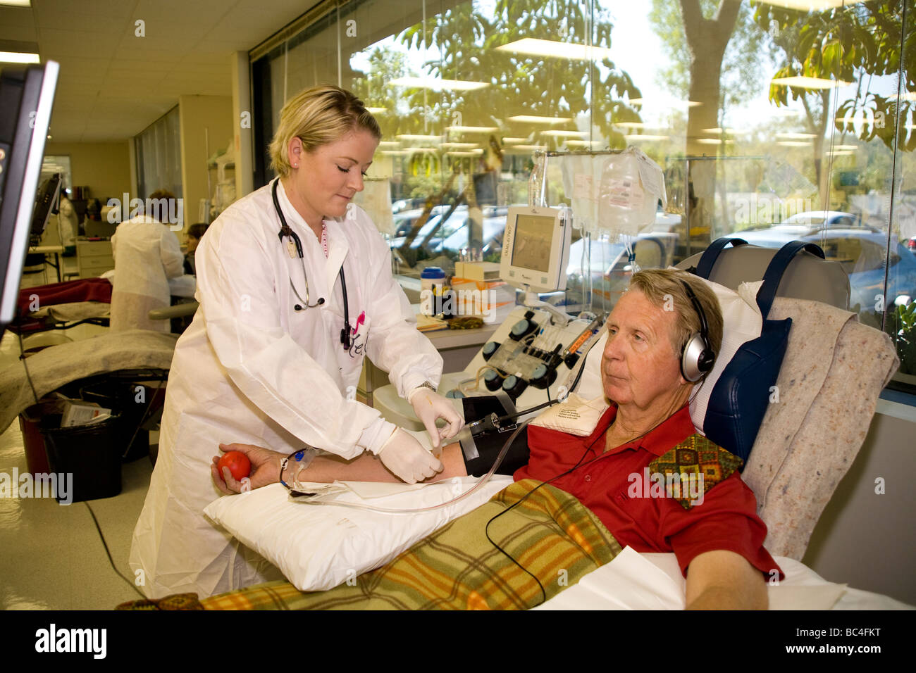 California Red Cross technician with blood platelet donor. MR  © Myrleen Pearson Stock Photo