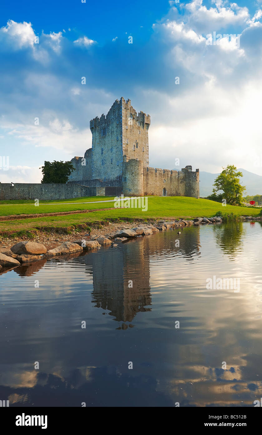 Ross Castle reflected in Lough Leane at Killarney Co Kerry Ireland Stock Photo