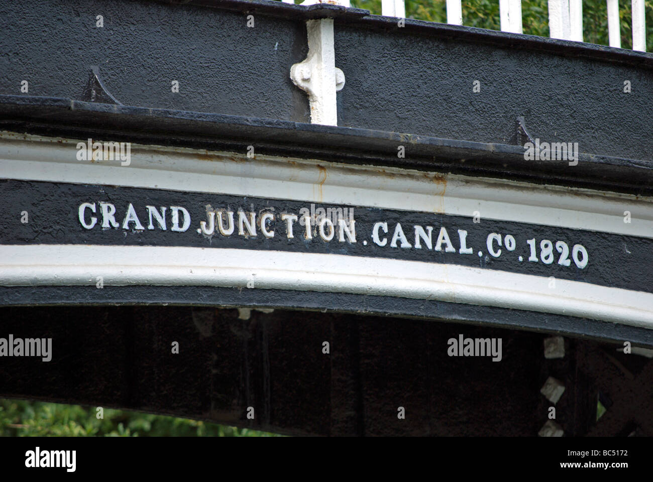 inscription reading grand junction canal company 1820, on gallows bridge crossing the grand union canal,  brentford, london, uk Stock Photo
