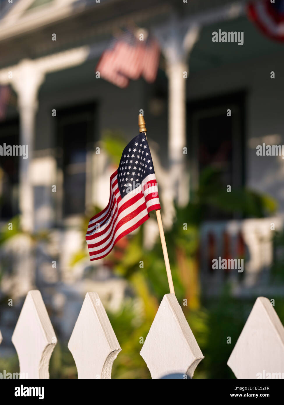 Flag of the United States on a picket fence Stock Photo