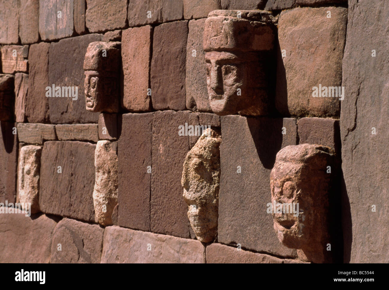 SEMI UNDERGROUND TEMPLE with carved enemy heads TIWANAKU RUINS URBAN STAGE 1 AD 374 AD Stock Photo