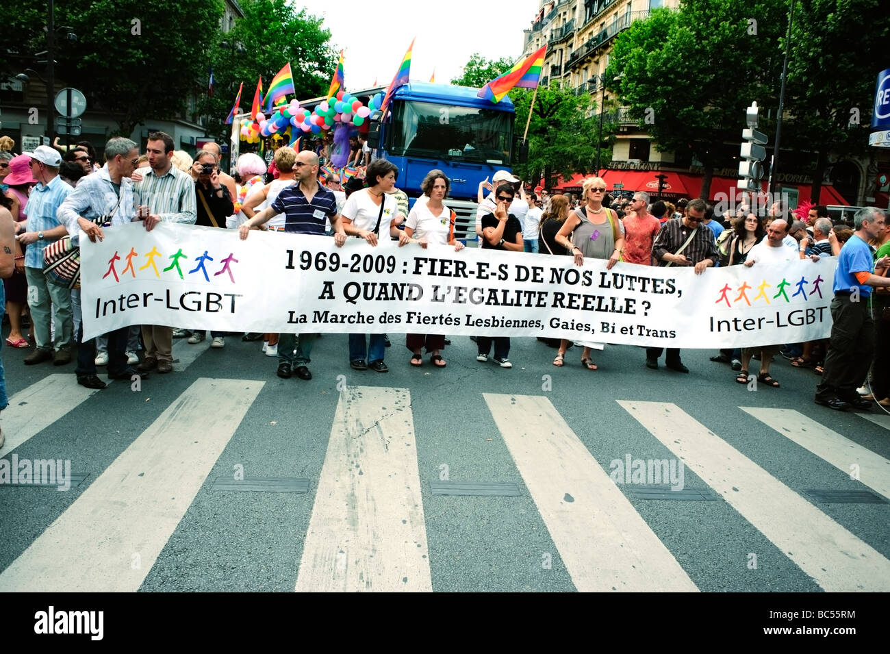 Paris France, Public Events People Celebrating at the Gay Pride Parade "French Sign" "1969 - 2009 Proud of our Struggles", lgbt march banner, g Stock Photo