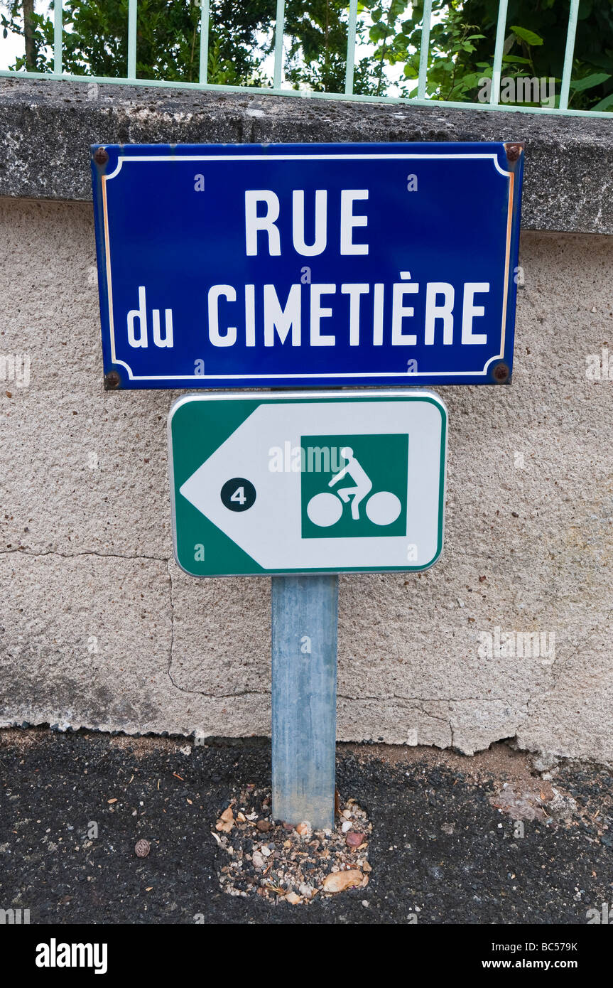 French blue enamel street sign "Rue du Cimetiere", France. Stock Photo