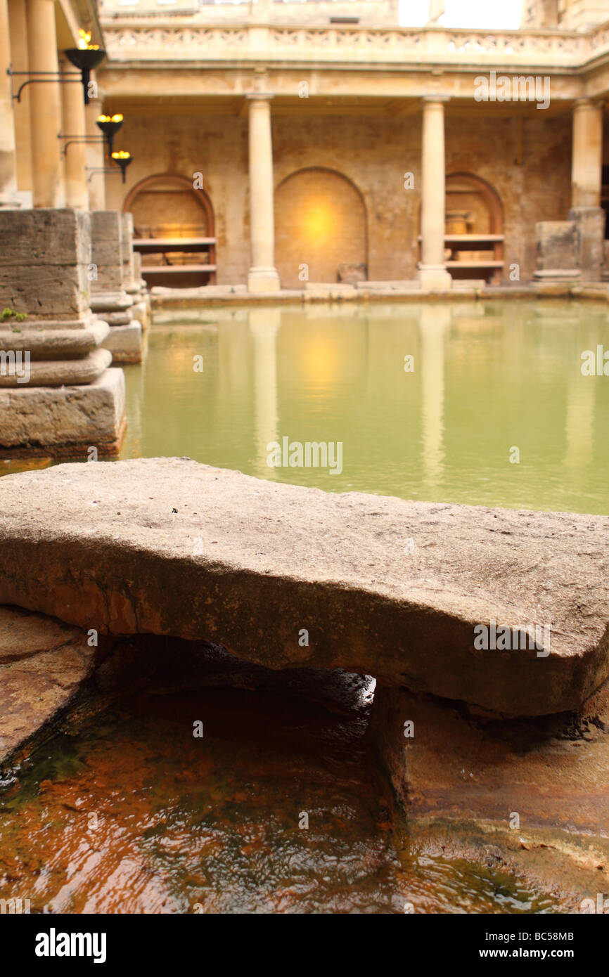 The Roman Baths main thermal spa pool in the city of Bath England Stock