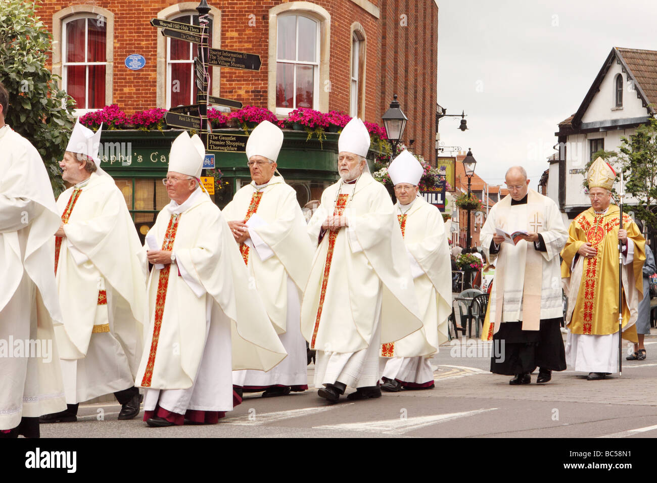 Glastonbury Pilgrimage Somerset UK the annual Christian procession festival of Pilgrims clergy and Bishops along the High Street June 2009 Stock Photo