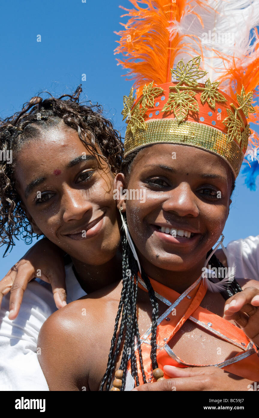 Colourful costumed pretty young woman with boyfriend Carnival Mindelo Cabo Verde Africa Stock Photo