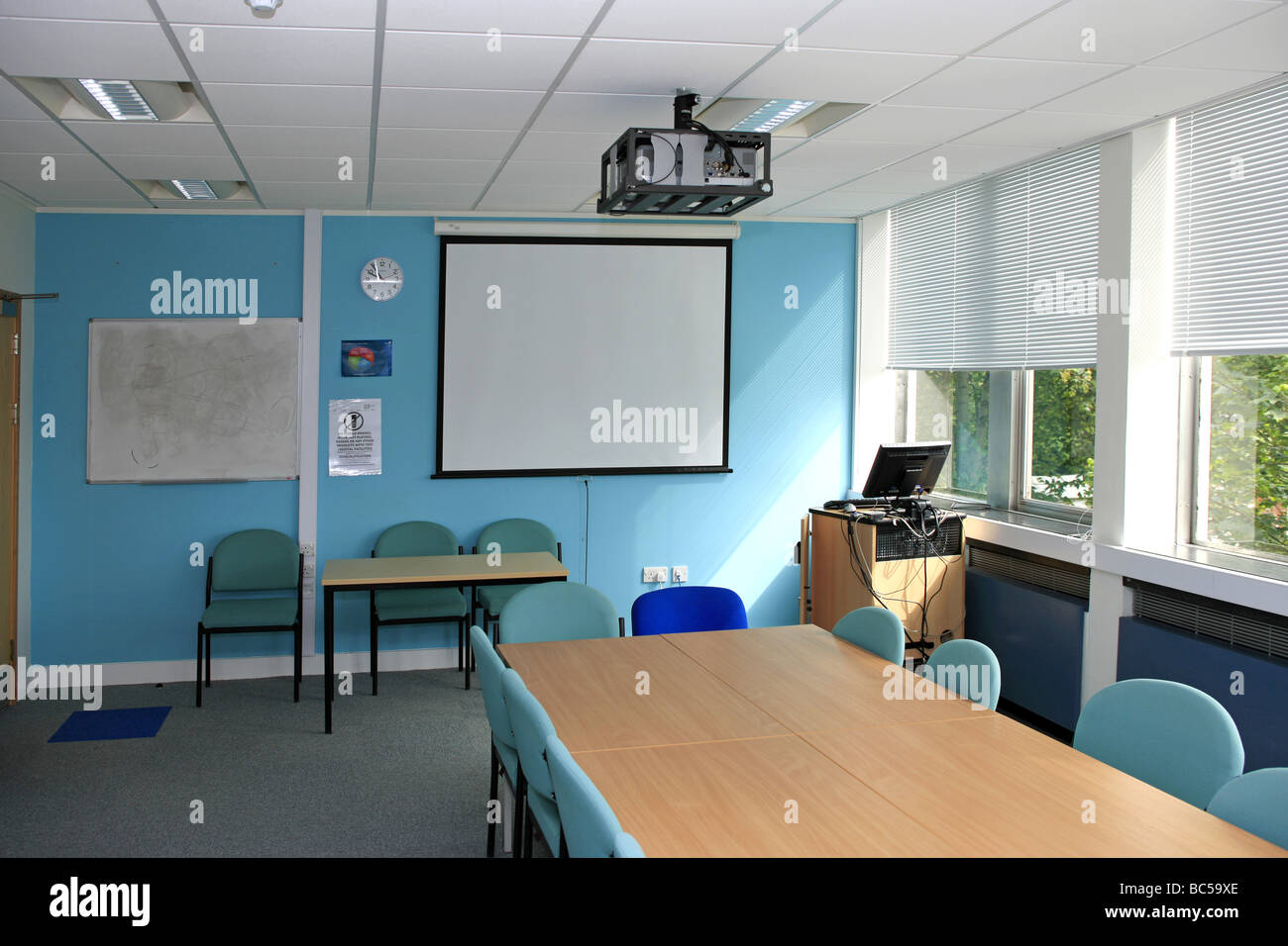 Modern Classroom with laptop projection screen Stock Photo