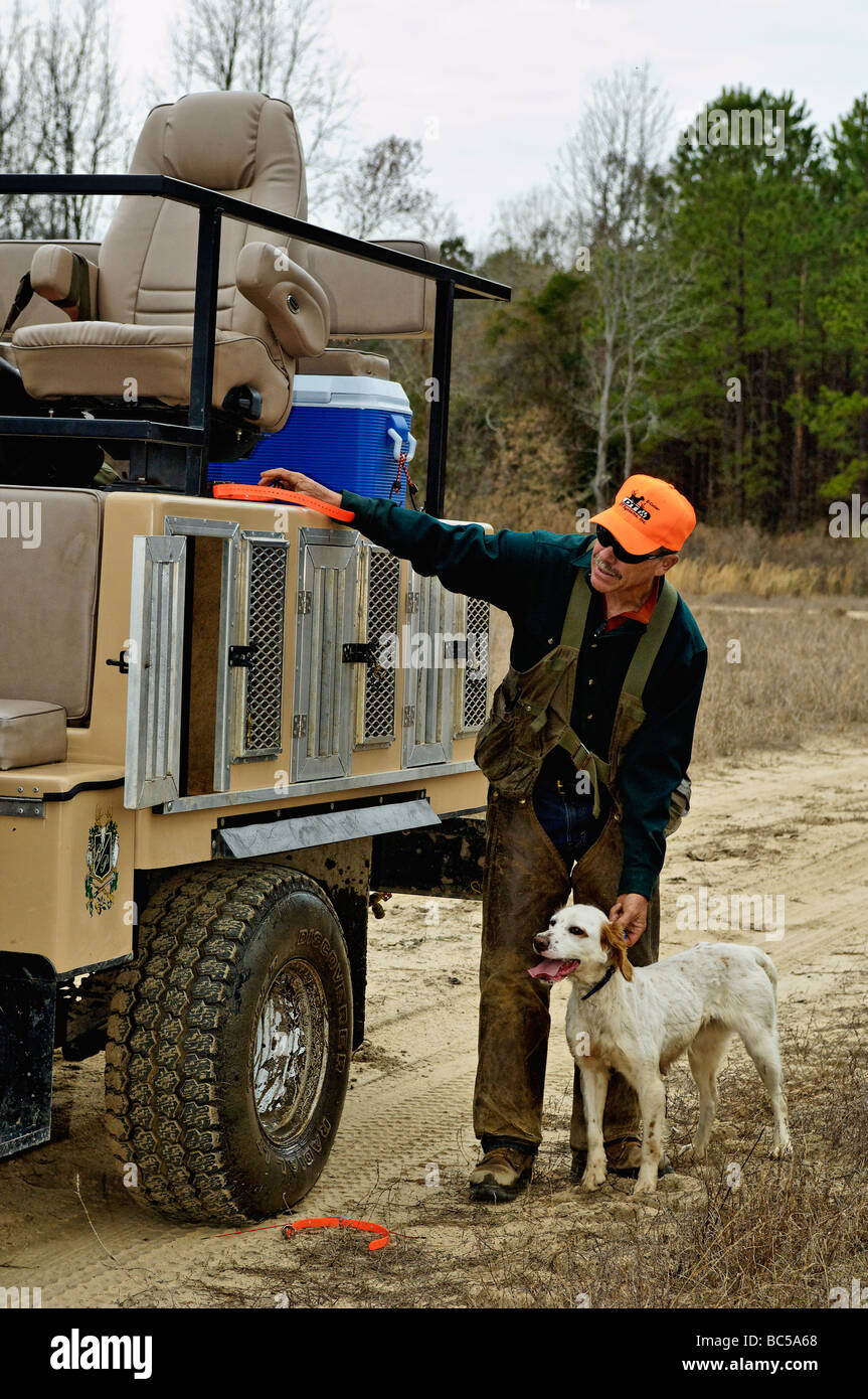 Dog Trainer George Hickox with English Setter at Hunting Rig in the Piney Woods of Georgia Stock Photo