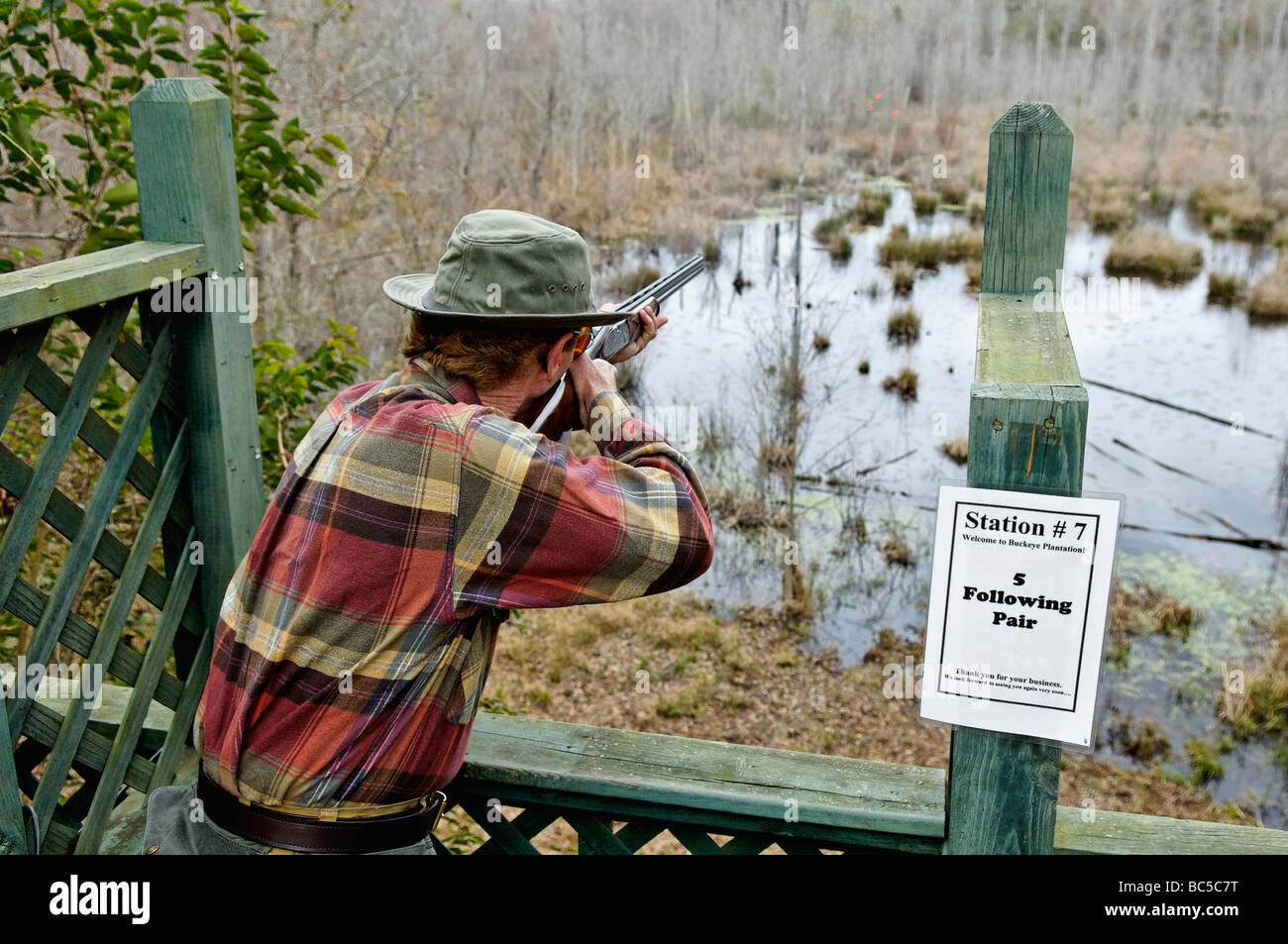 Man Shooting Shotgun on Sporting Clays Course at Buckeye Plantation in