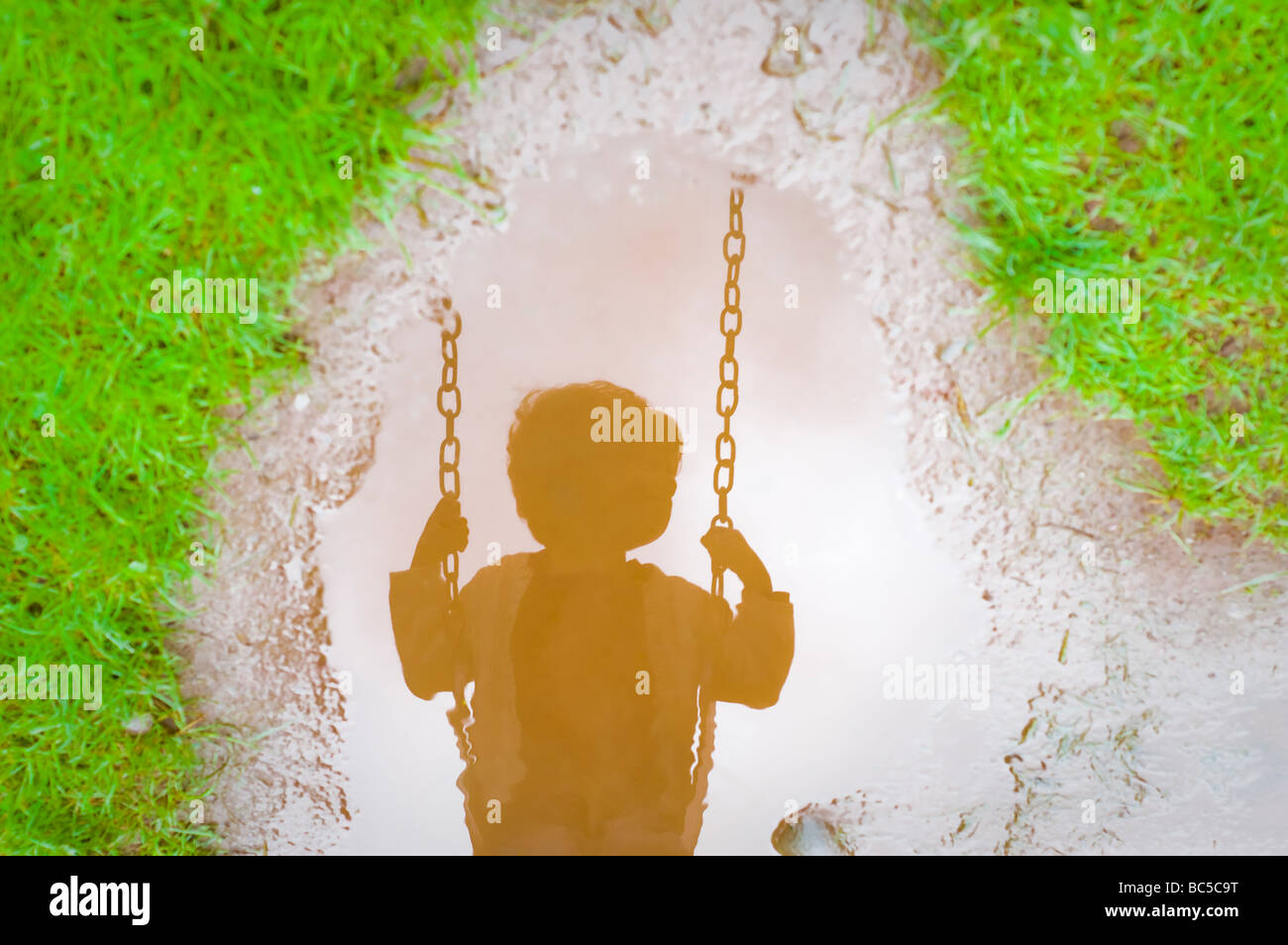 Child in mud puddle hires stock photography and images Alamy