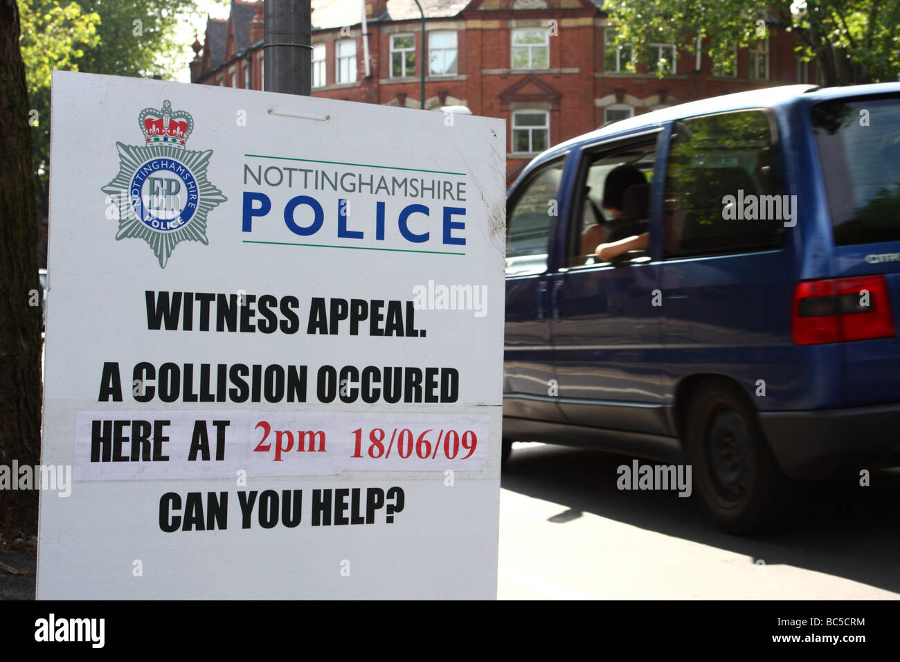 A Nottinghamshire Police roadside Witness Appeal sign at the scene of a Road Traffic Accident in Nottingham city centre. Stock Photo