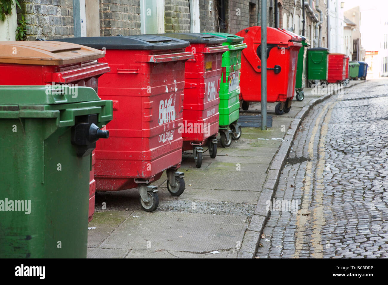 wheelie bins in a street Stock Photo Alamy