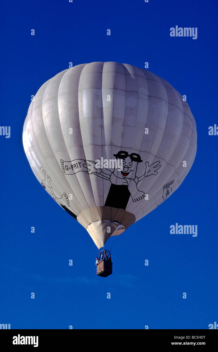 Hot air balloon isolated against a deep blue sky backdrop Stock Photo ...