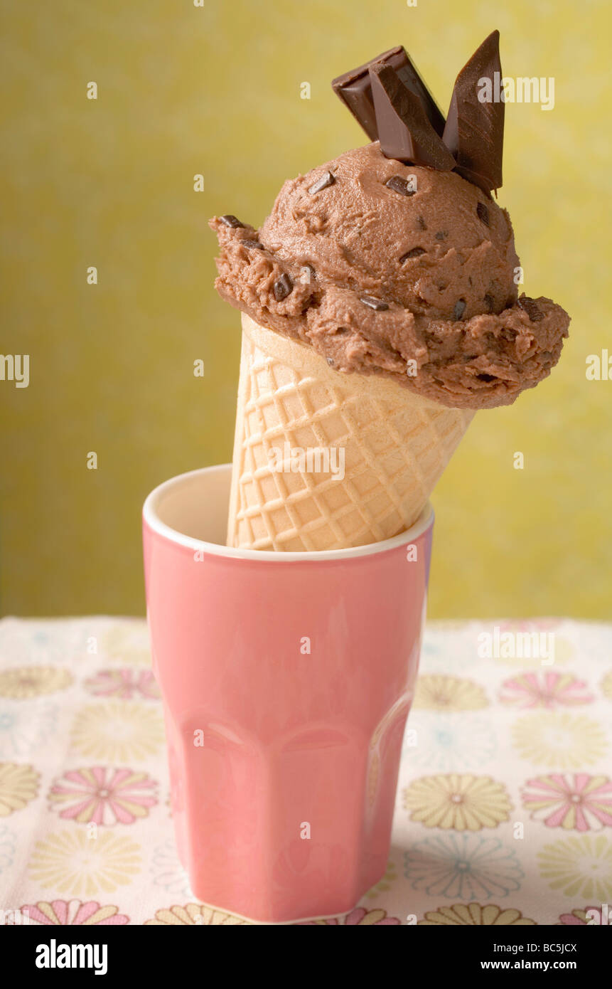 Chocolate ice cream cone in pink beaker Stock Photo Alamy