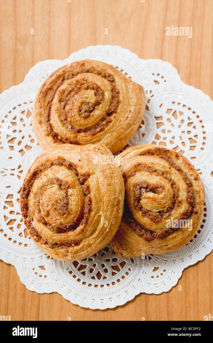 Three Danish pastry snails with nut filling Stock Photo Alamy