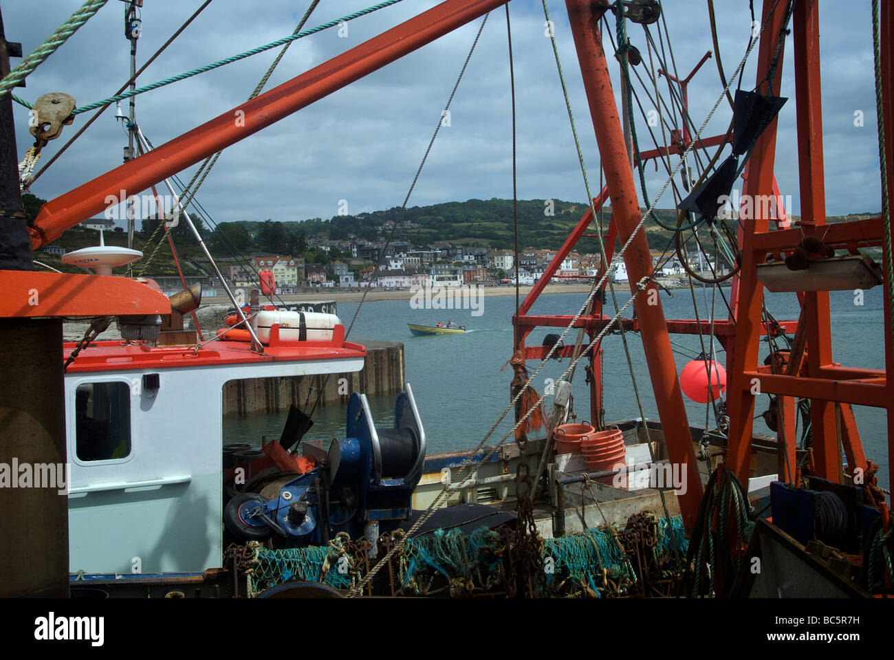 Lyme Regis Holiday Resort Dorset UK Harbour Fishing Boat Stock Photo