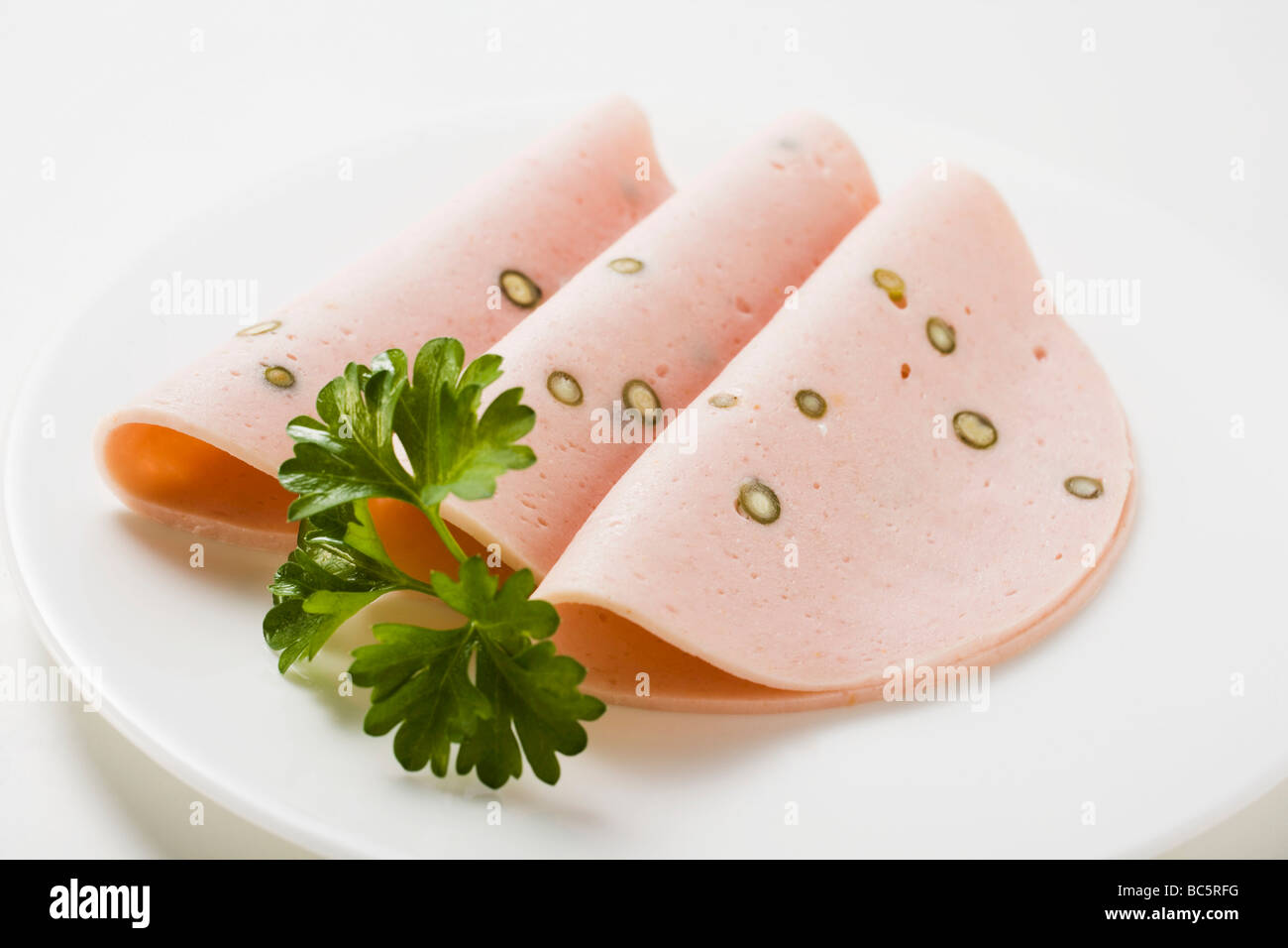 Three slices of Pfefferwurst (pepper sausage Stock Photo - Alamy