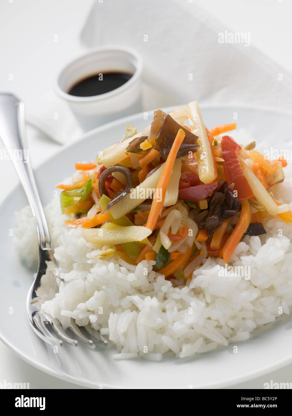 Rice with Asian vegetables, soy sauce Stock Photo Alamy