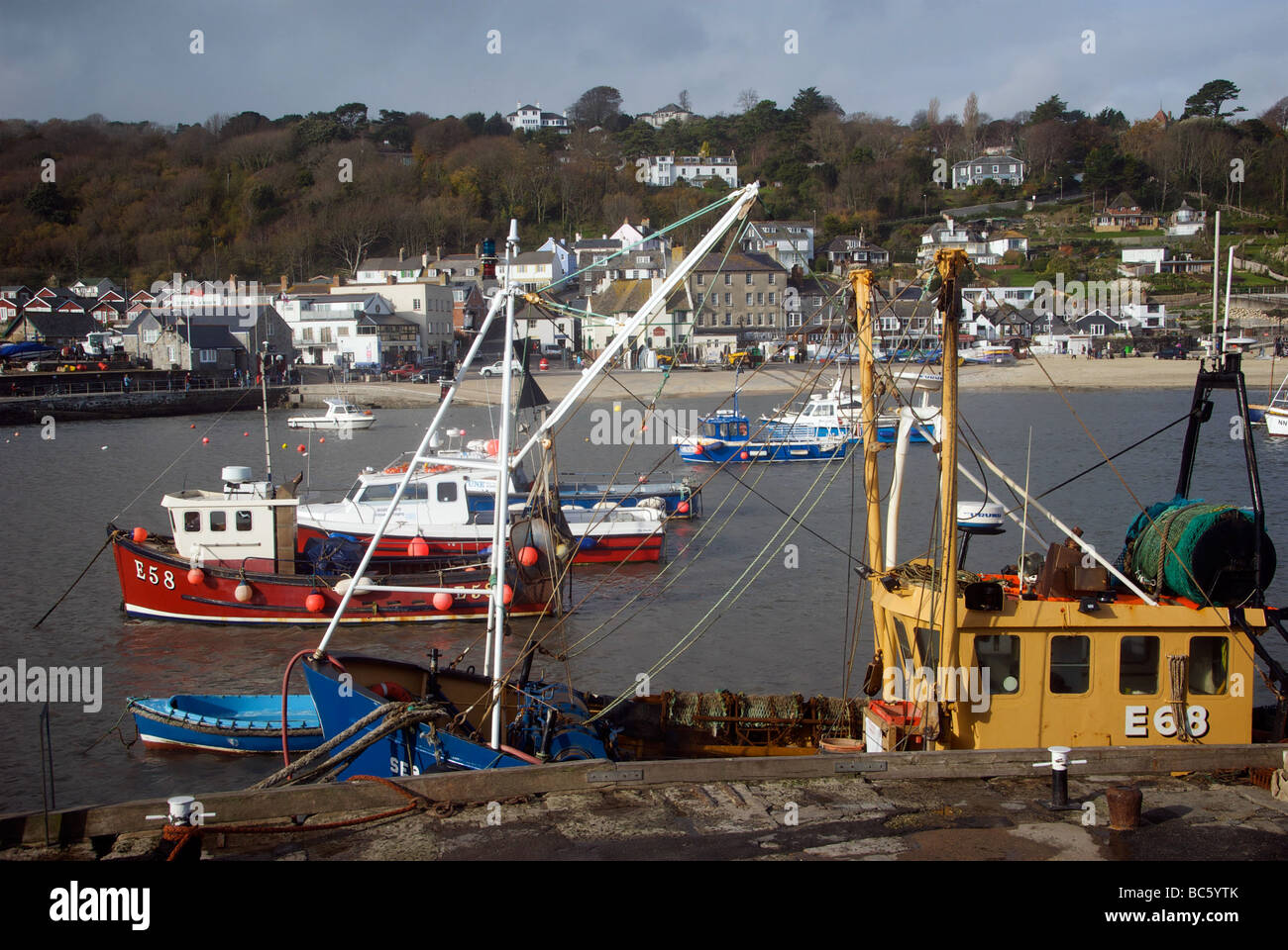 Lyme Regis Holiday Resort Dorset UK Fishing Boats Harbour Quay Stock