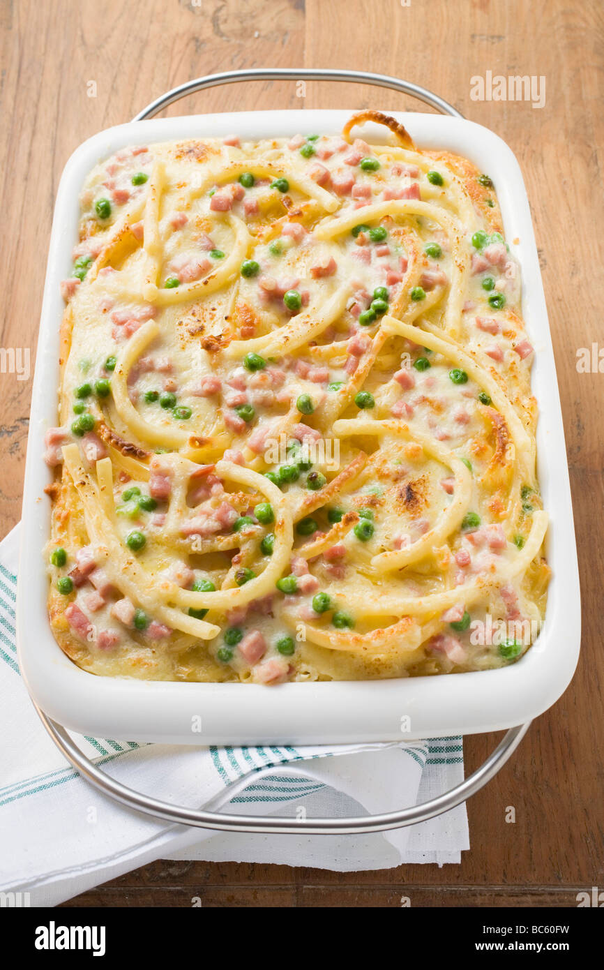 Macaroni bake with ham and peas Stock Photo Alamy