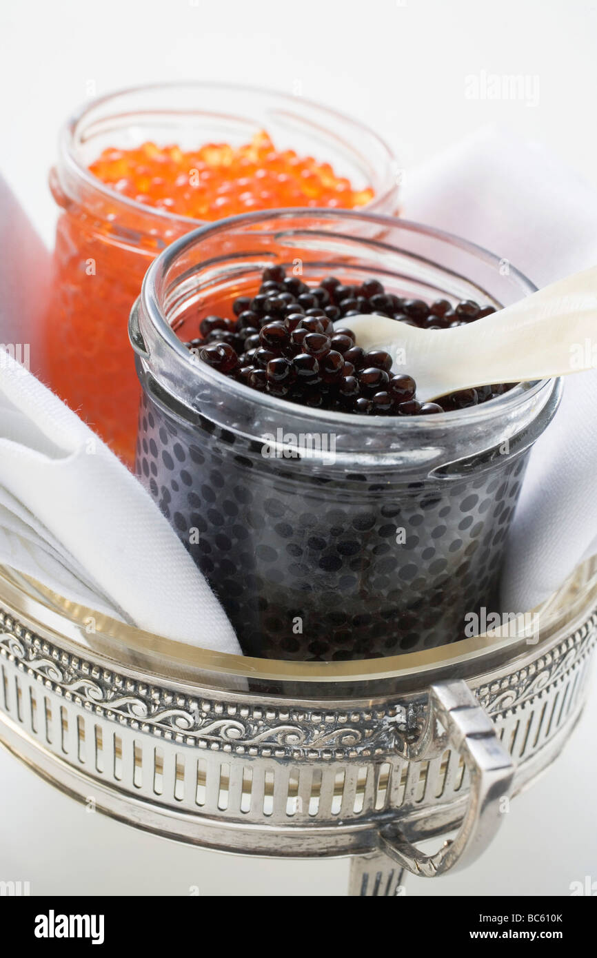 Black caviar and Keta caviar in jars Stock Photo - Alamy