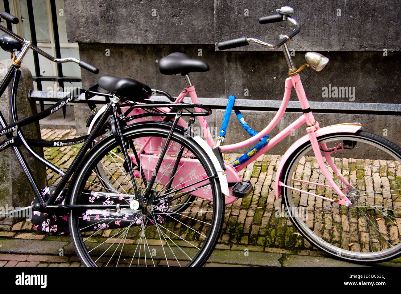 Pink and white bicycles on the Spui Stock Photo