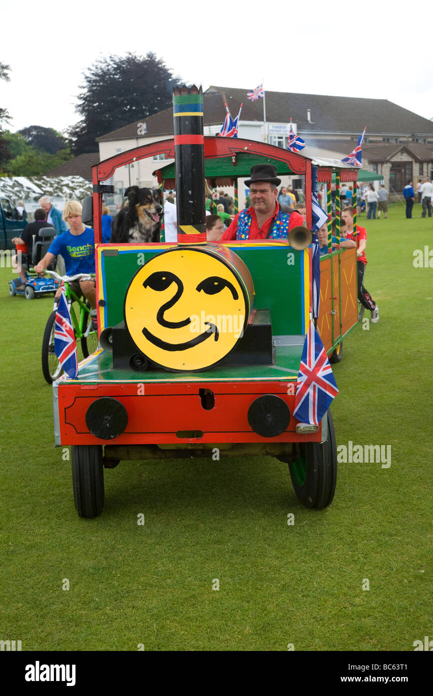 Toy train ride for children at summer fete Stock Photo Alamy
