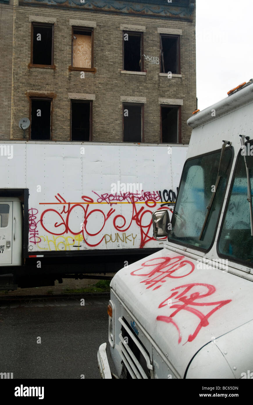 Trucks vandalized with graffiti in the Brooklyn neighborhood of Bedford Stuyvesant Stock Photo