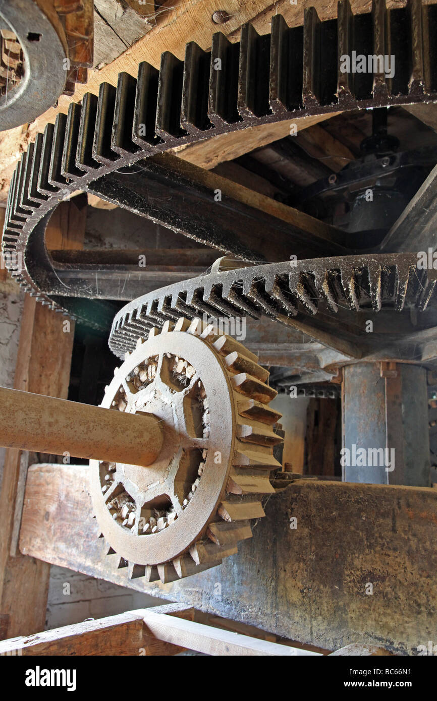Gear wheels in side a water mill. Stock Photo