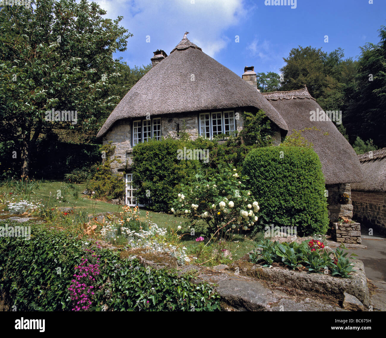A charming thatched roofed cottage is typical of older homes in