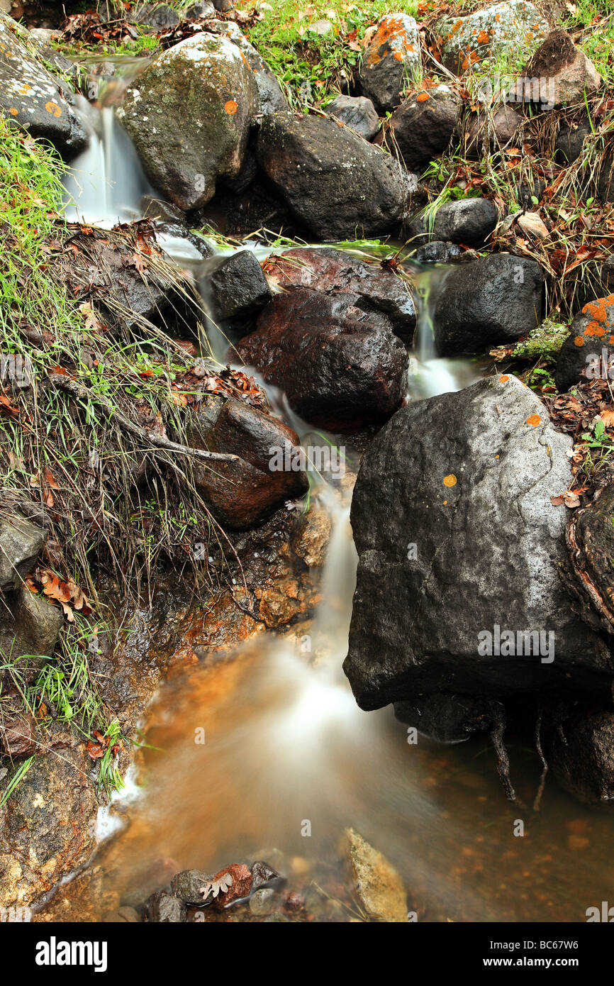 Water flowing down rocks Stock Photo