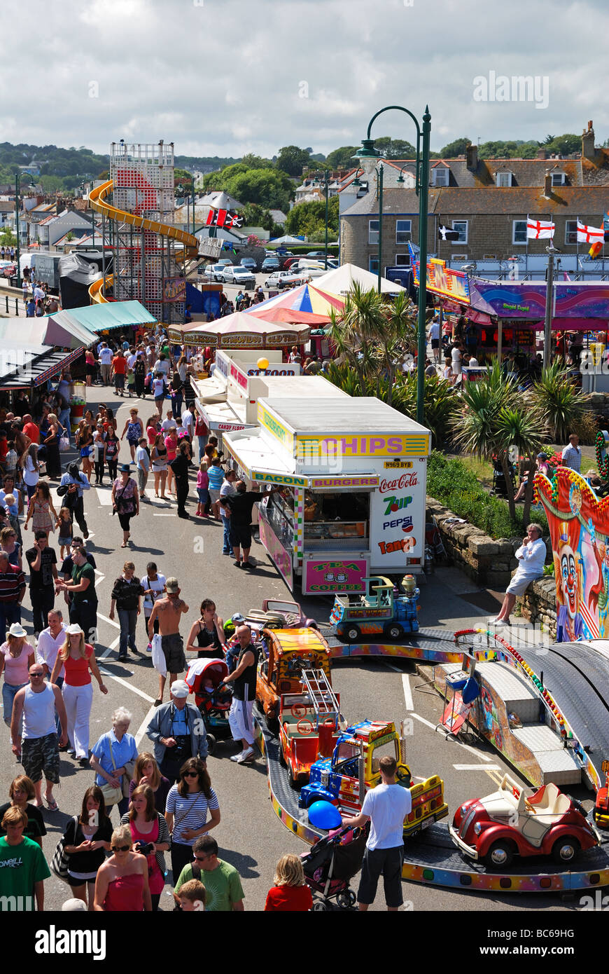 crowds of people at the fairground on mazey day in penzance,cornwall,uk Stock Photo