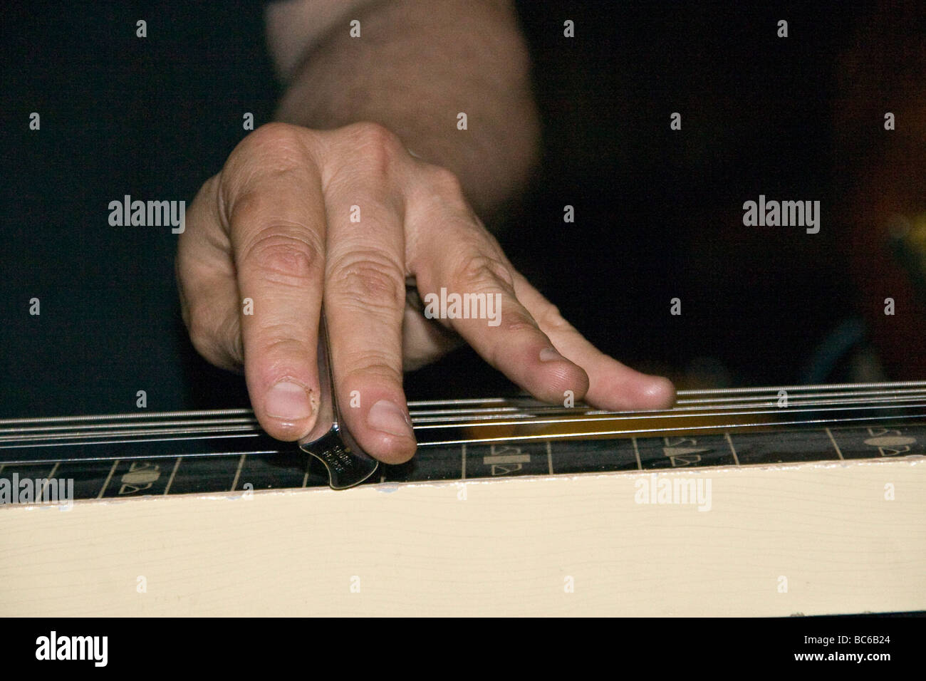 Closeup of Son Henry playing the Lap Steel Guitar during the live