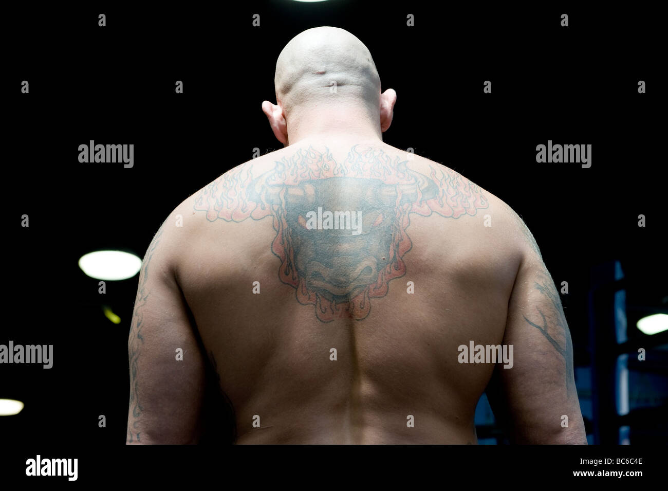 A mixed martial arts fighter demonstrates his strength Stock Photo Alamy