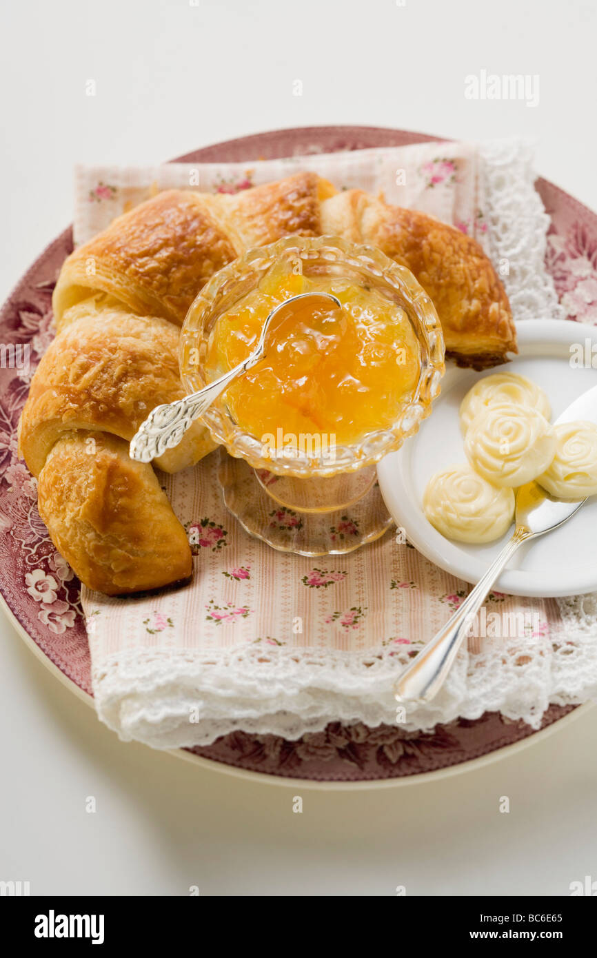Orange marmalade, croissant and butter Stock Photo Alamy