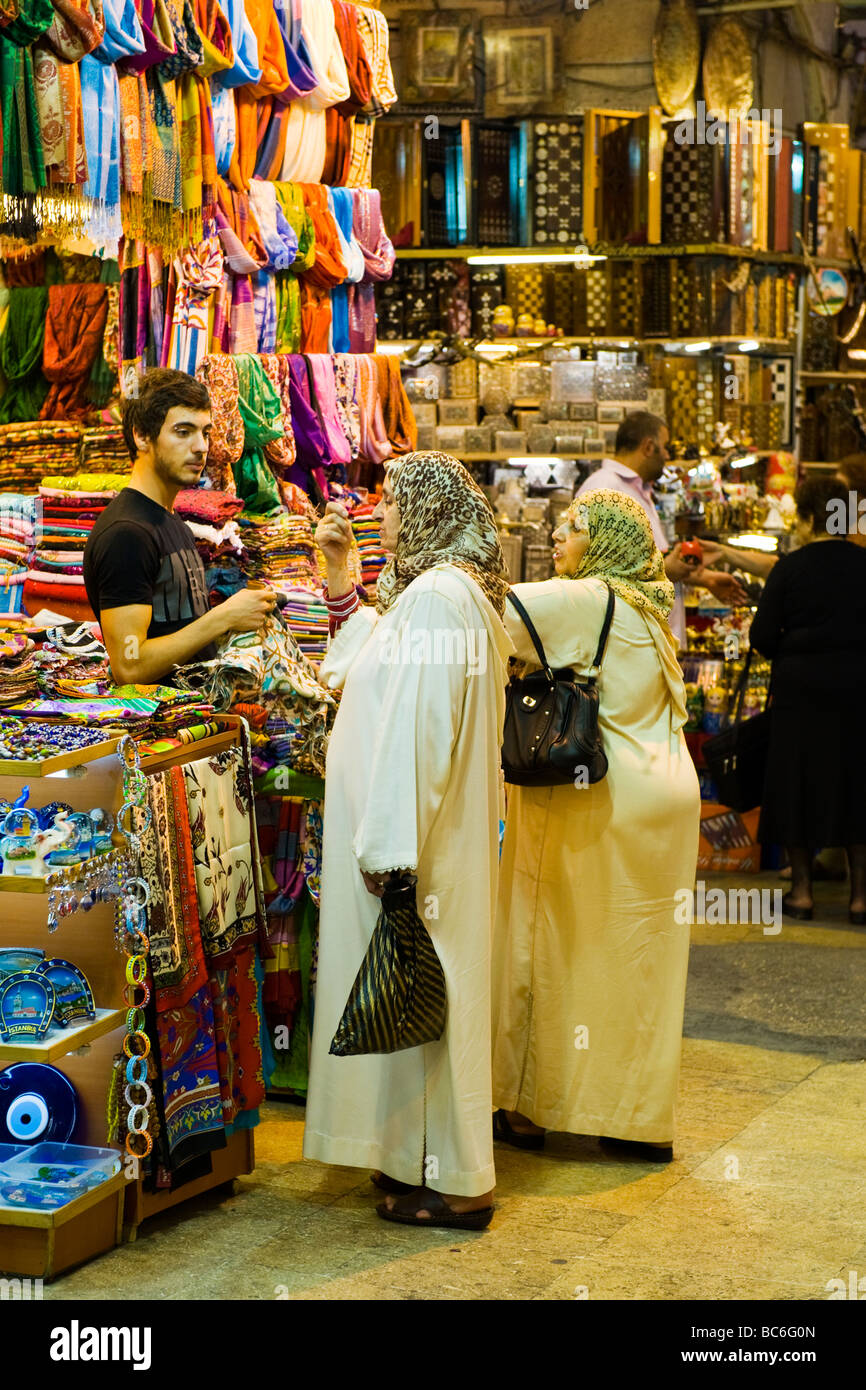 Turkey , Istanbul , The Grand Bazaar or Kapali Carsi , established 1453 ,  Arab women in hijab buy scarves Stock Photo - Alamy