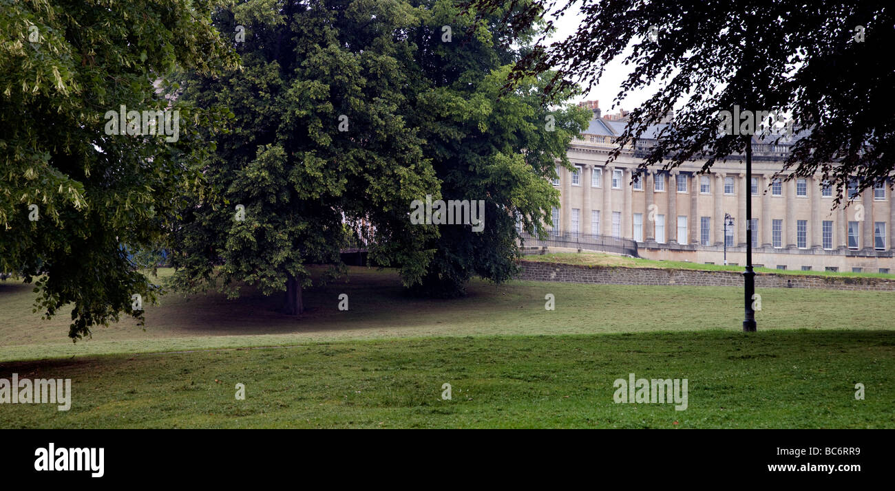 The Royal Crescent in Bath, England, WITH OPEN AREAS OF LAWN AND TREES Stock Photo