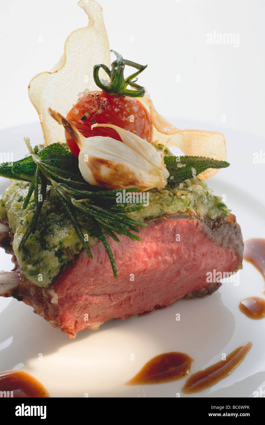 Roast rack of lamb with herb crust Stock Photo Alamy