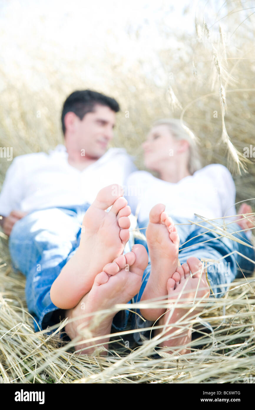 couple relaxing on crop Stock Photo - Alamy