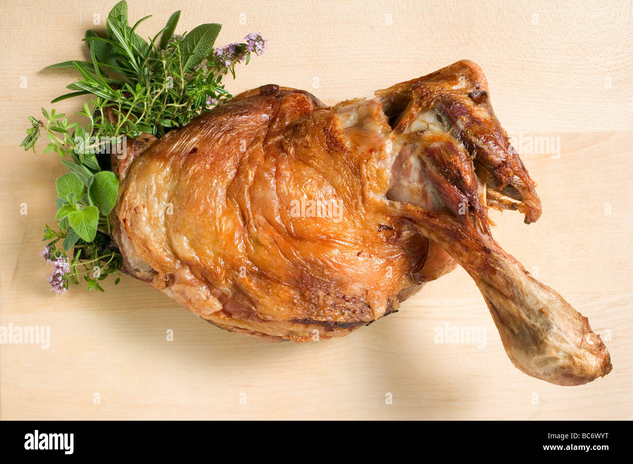 Roast leg of lamb with fresh herbs Stock Photo - Alamy