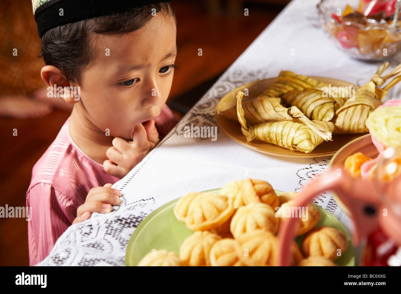 Little Malay Boy Can T Wait To Eat Food On The Table Stock Photo Picture And Royalty Free Image Image 119102199