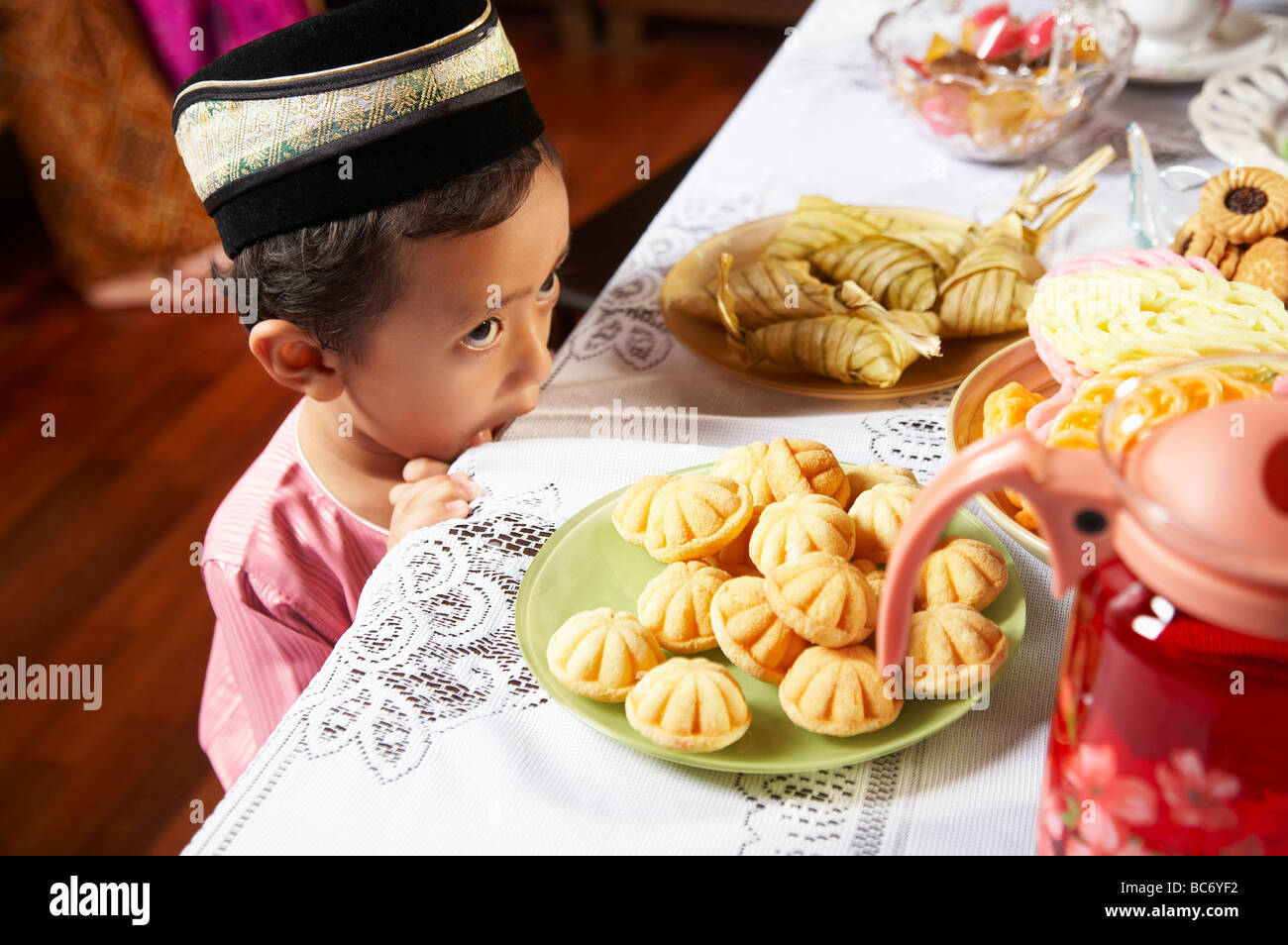 Little Malay Boy Can T Wait To Eat Food On The Table Stock Photo Alamy
